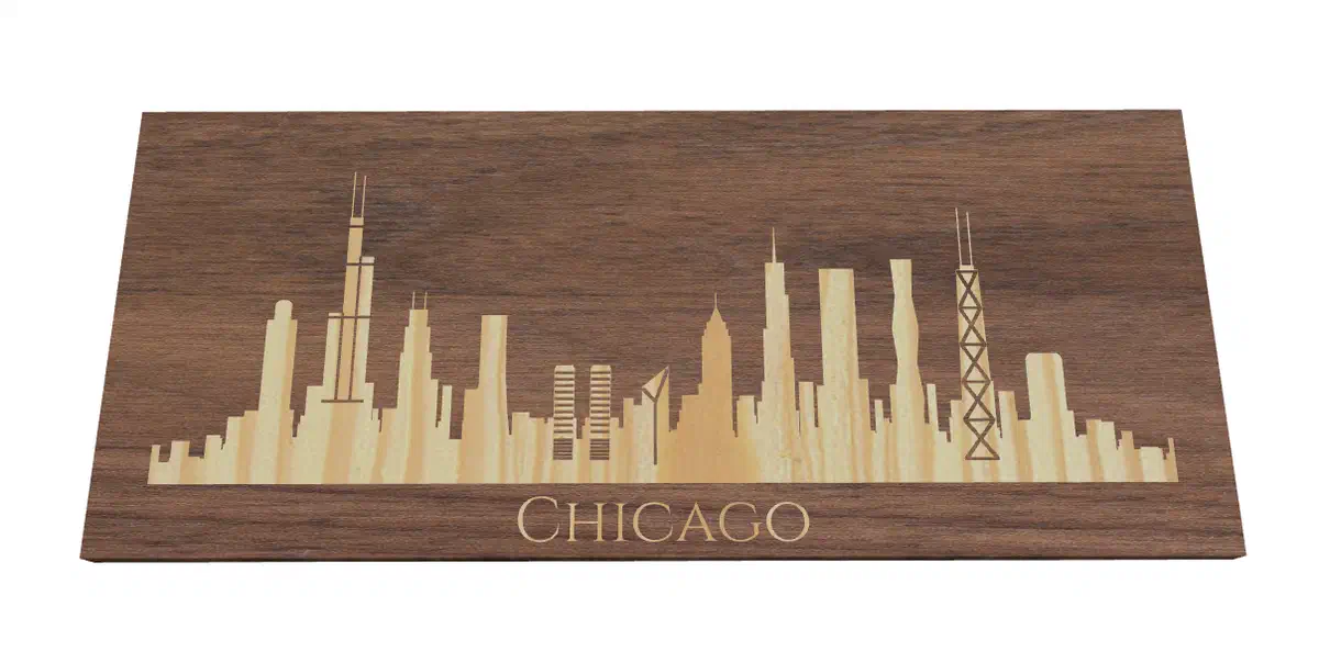 A dark wood plaque design with a pale Chicago skyline and CHICAGO lettering