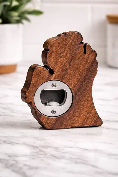 Walnut Michigan-shaped bottle opener with a recessed metal insert visible on its back