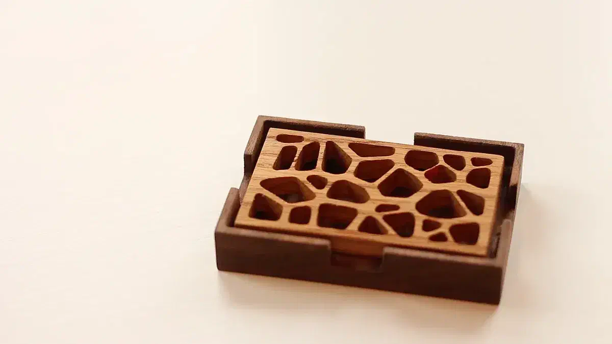 Finished walnut soap-dish tray with a contrasting open oak insert