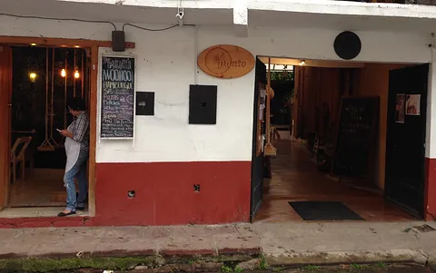 El Punto, rustic restaurant Sign