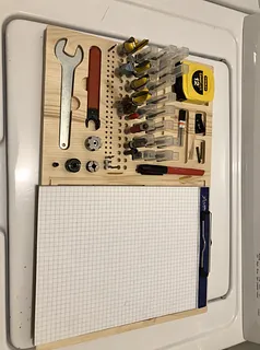 Tool holder/organizer with clipboard clip