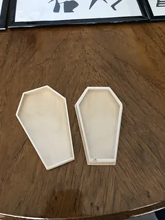 Coffin box with fitted lid