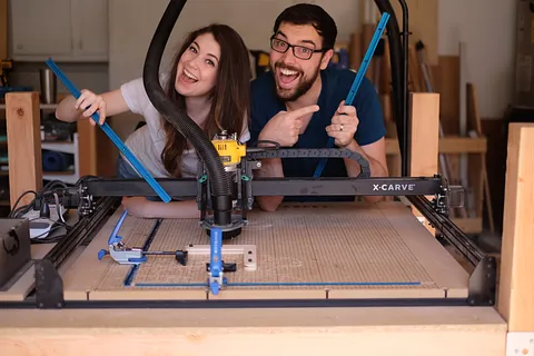 Adding t-track clamps and bracket to X-Carve