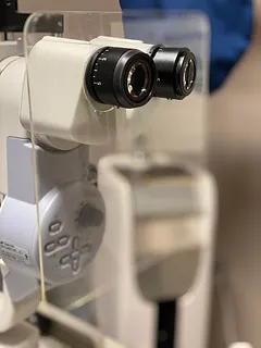 Slit lamp cough shield