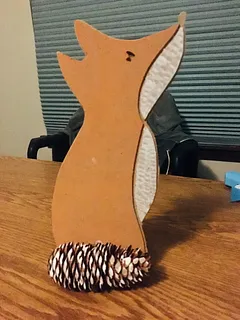 Fox with pine cone tail