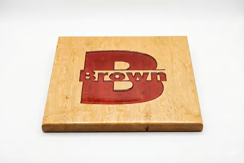 Brown Monogram Engraved Bemio Font in Plain Style