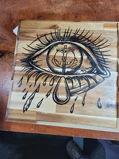 Jesus-crying eye cross